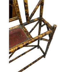 Victorian bamboo hallstand, bevelled mirror over red lacquered and chinoiserie decorated panels, fitted with six brass hooks 