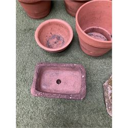 Set of five terracotta planters, small stone trough and urn plinth  - THIS LOT IS TO BE COLLECTED BY APPOINTMENT FROM DUGGLEBY STORAGE, GREAT HILL, EASTFIELD, SCARBOROUGH, YO11 3TX