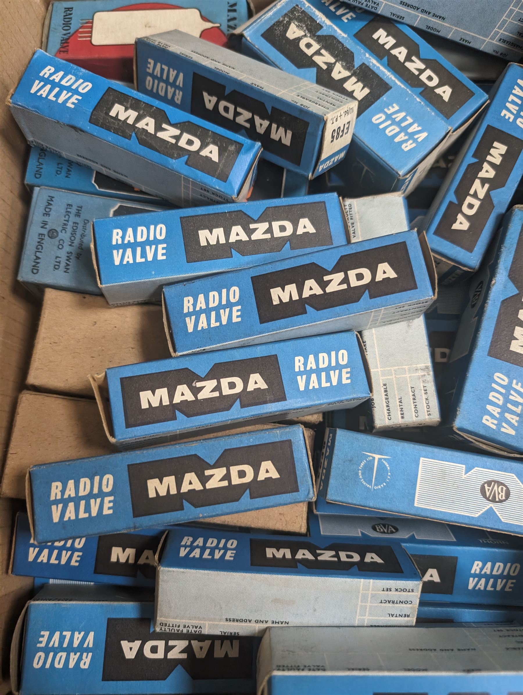 Large collection of Mazda thermionic radio valves/vacuum tubes, including boxed examples and loose bubble wrapped and identified examples