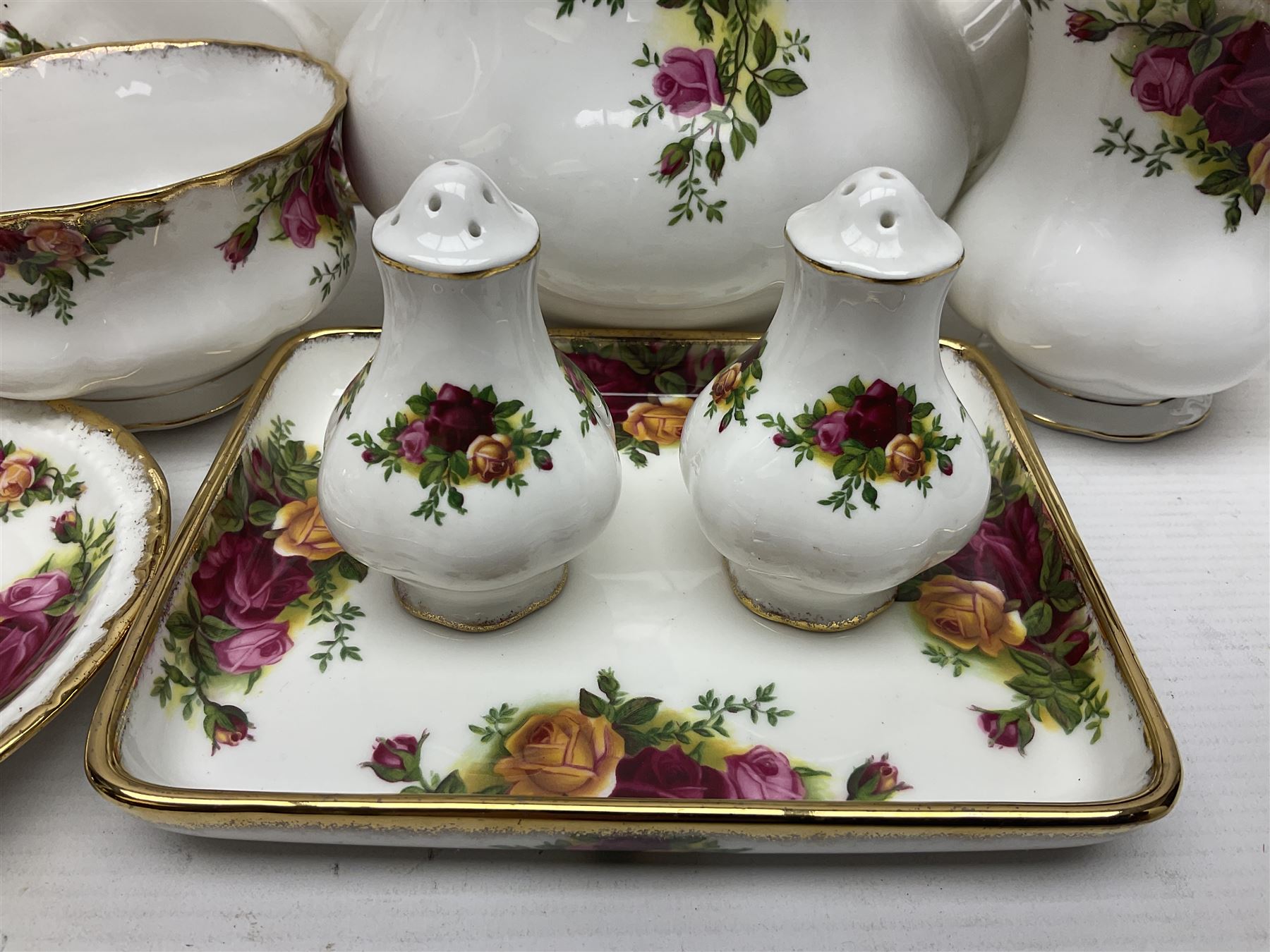 Royal Albert Old Country Roses, tea service for six, comprising teapot, milk jug, open sucrier, teacups and saucers, cake plate, together with other items 