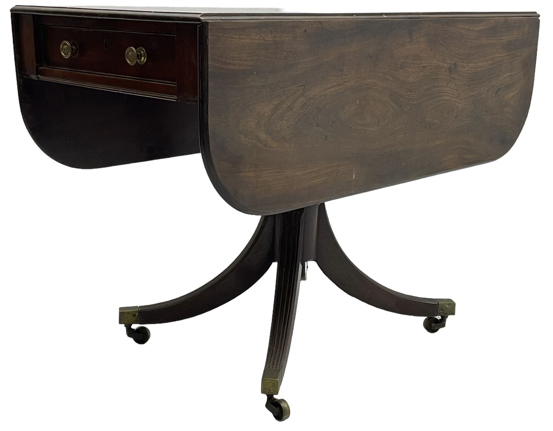 George III mahogany Pembroke table, moulded rectangular drop-leaf top with rounded corners, fitted with single cock-beaded end drawer, on turned pedestal with four reed moulded supports, brass cups and castors 