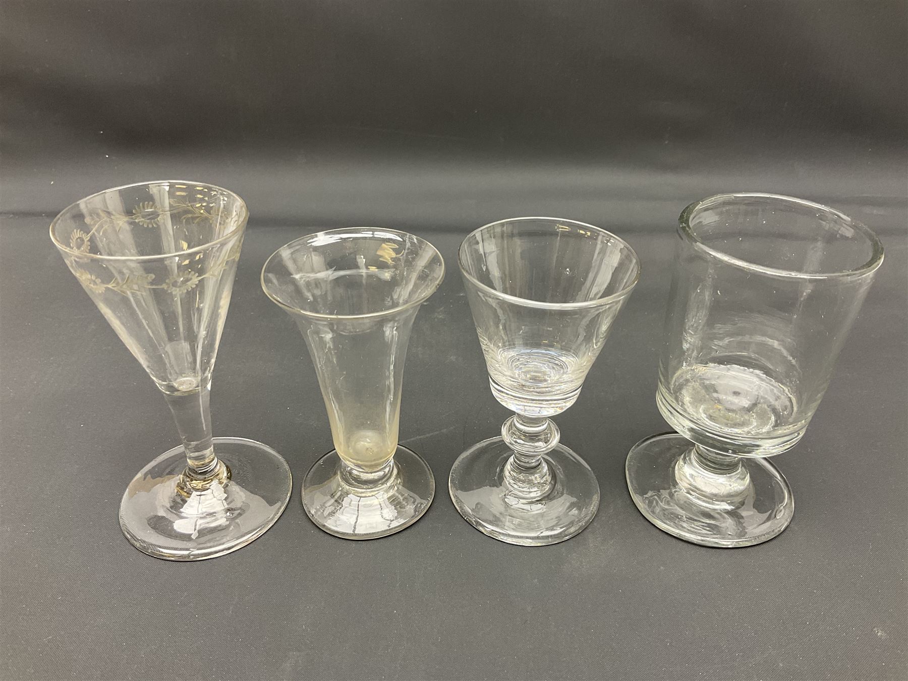 Collection of 18th century and later glassware, including set of three with twist stems and etched and fluted examples