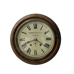 Camerer Kuss & Co -  8-day wall clock with alarm, mahogany dial surround and brass bezel, 8