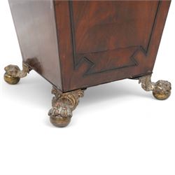 George III mahogany wine cooler or cellarette, the pointed hinged lid with turned final, square tapering body with applied geometric mouldings, on gilt metal and foliate cast ball and claw feet, with metal liner 