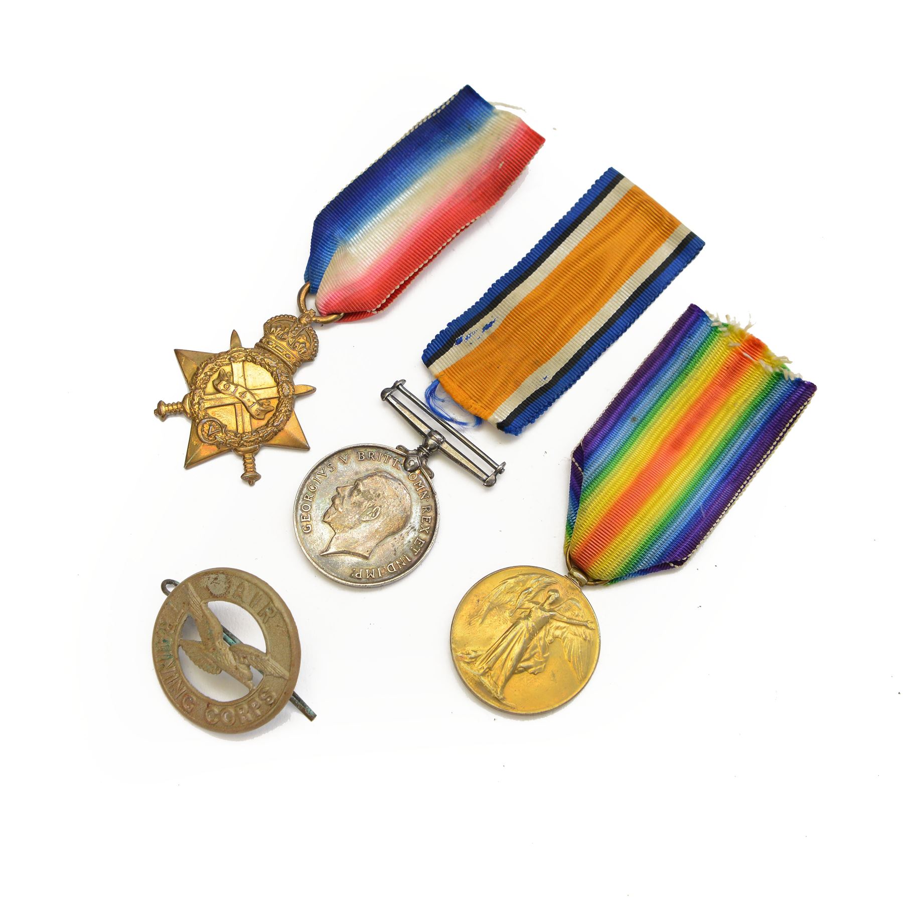 WWI trio of medals, comprising Victory Medal 1914-15 Star and British War medal, awarded to 66 BMBR /GNR F. Needham, together with an Air Training Corps badge