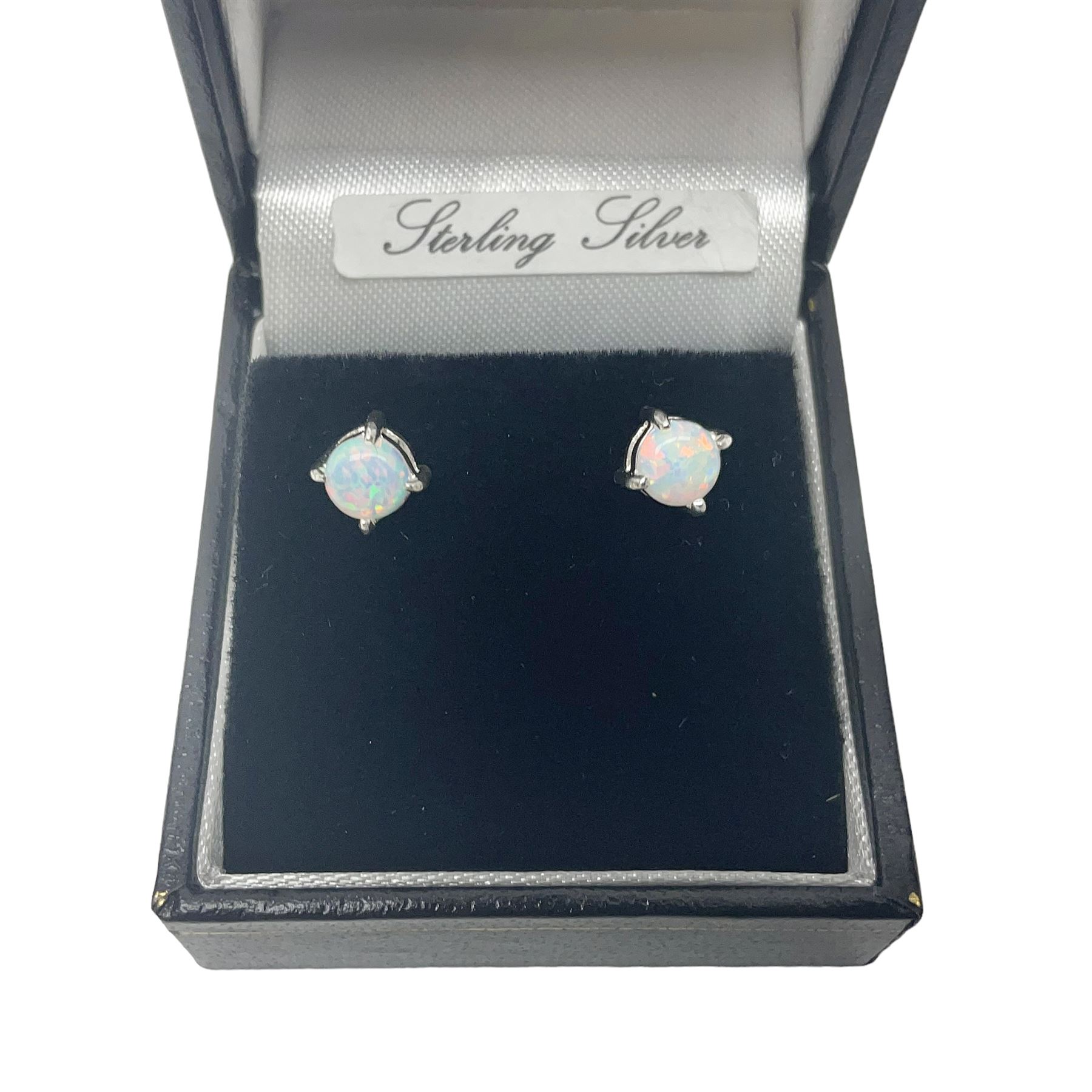 Pair of silver opal stud earrings, stamped 925, boxed 