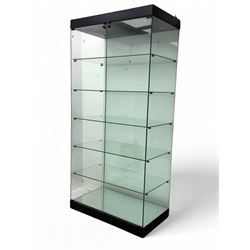 Glazed shop display cabinet fitted with two doors, six shelves with illuminated interior