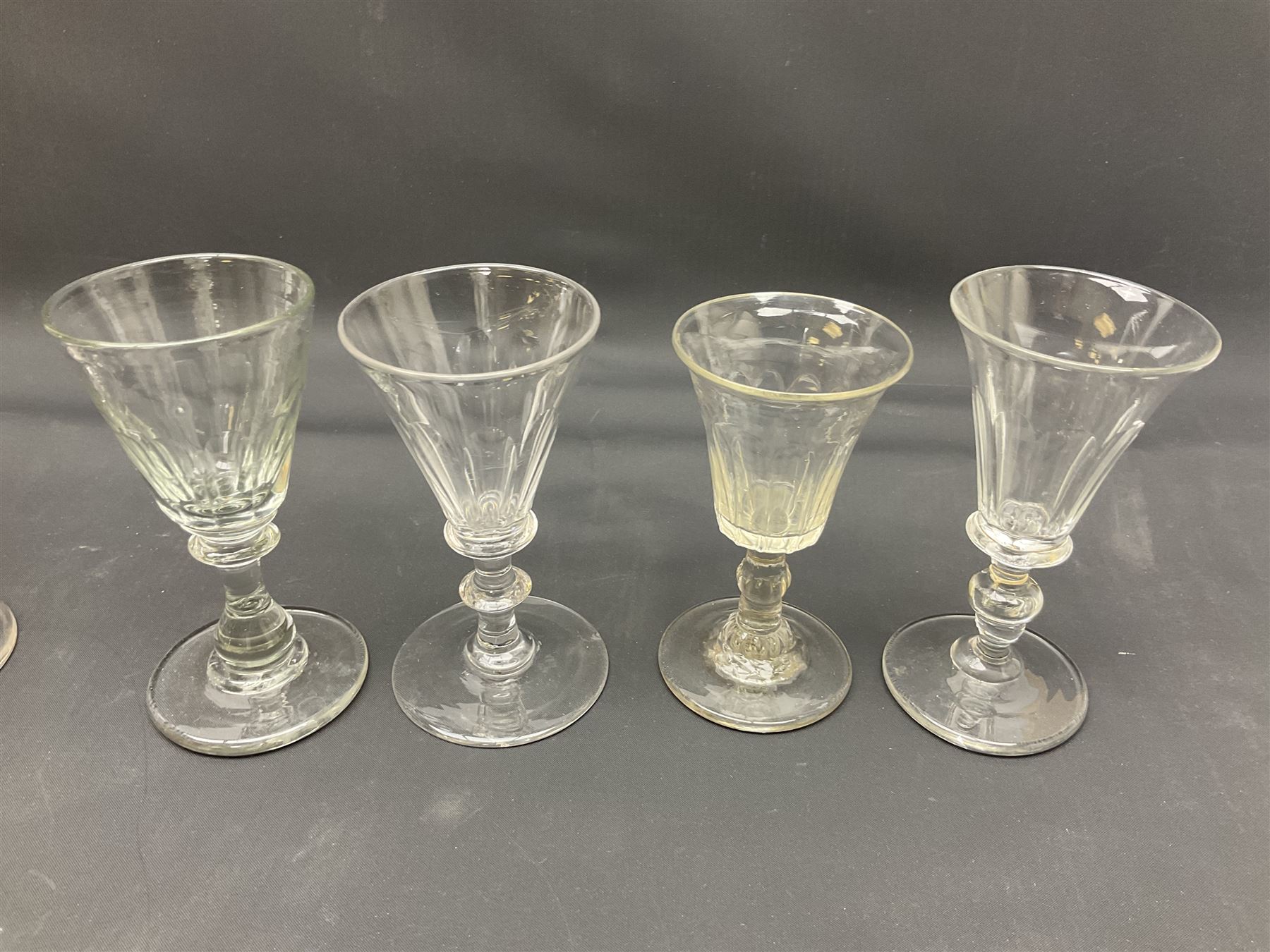 Collection of 18th century and later glassware, including set of three with twist stems and etched and fluted examples