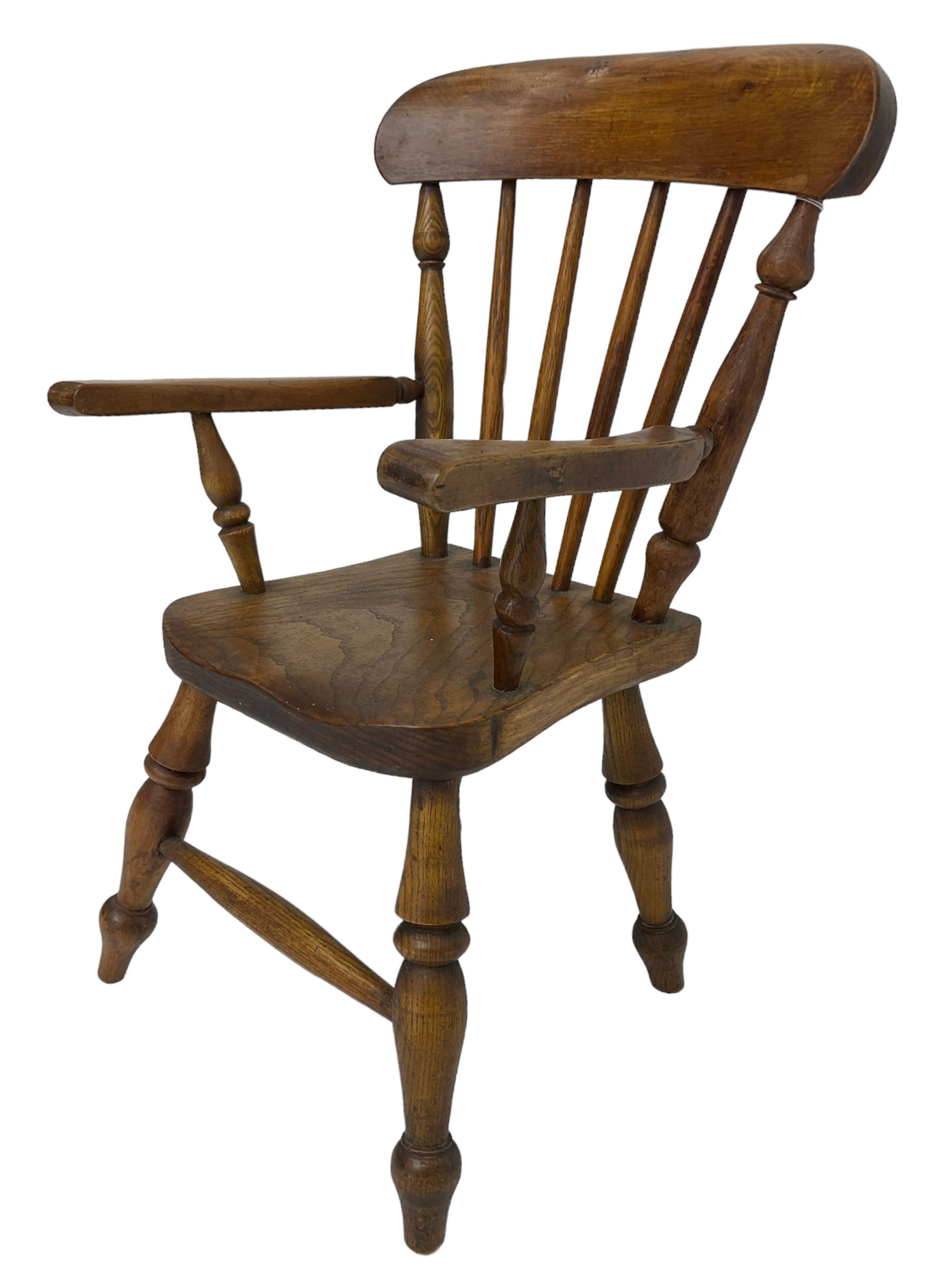 19th century elm and beech child's farmhouse chair, shaped cresting rail over stick back, on turned supports 