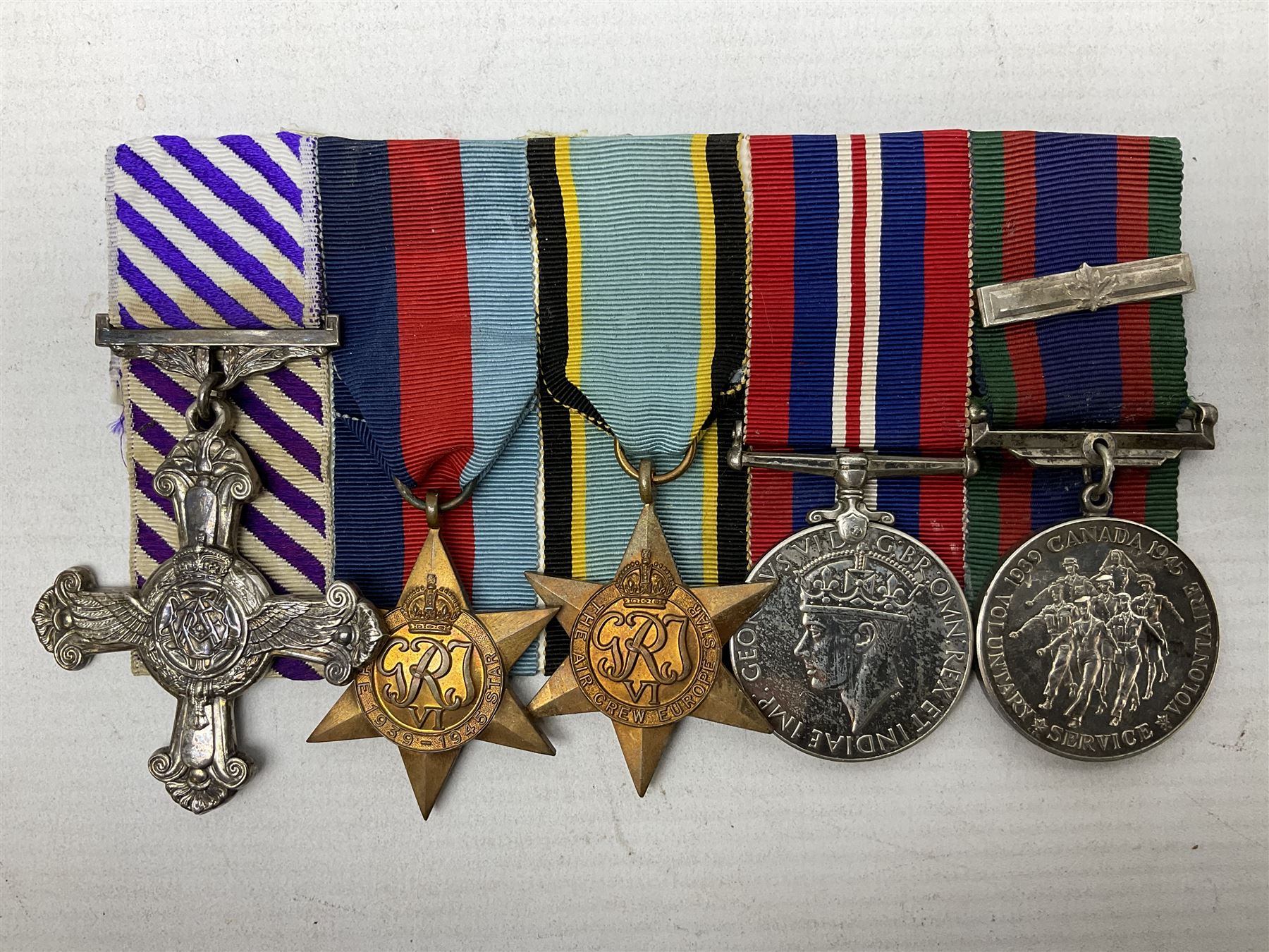 WW2 Royal Canadian Air Force group of five medals comprising Distinguished Flying Cross inscribed verso 1945 F/L Stephen M. Byrne 433 Squadron 1939/1945, 1939-1945 Star, Air Crew Europe Star, 1939-1945 War Medal and Canadian Volunteer Service Medal with maple leaf clasp; together with copies of research material including London Gazette Supplement