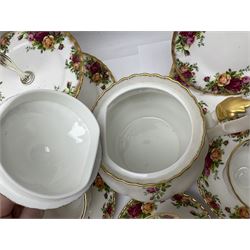 Royal Albert Country Roses pattern tea service for six, comprising Teapot, open sucurer, milk jug, cups and saucers, dessert plates and cake stand 