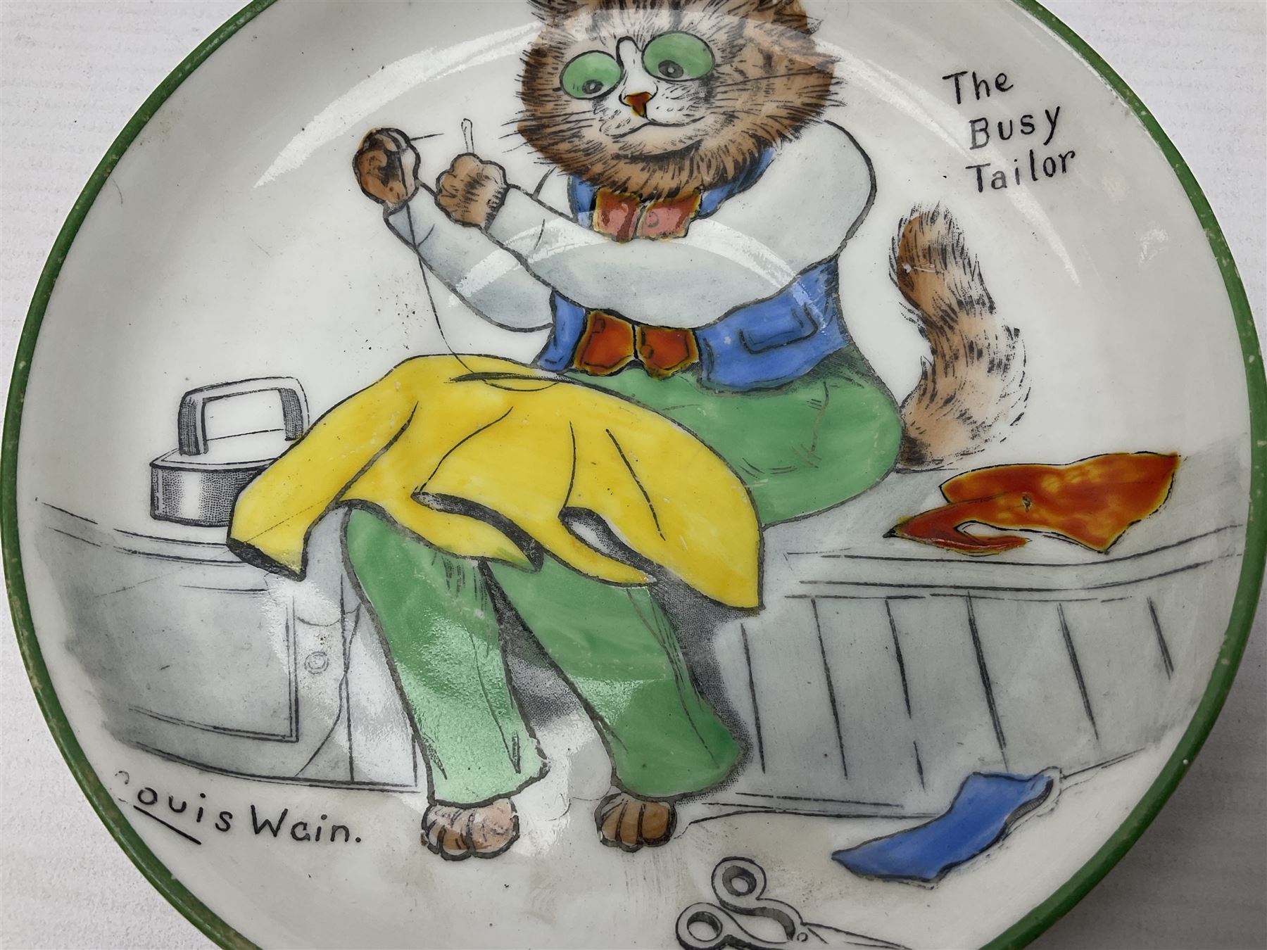 Paragon China Louis Wain 'The Busy Tailor'  hand painted saucer, from the Tinker Tailor series, D13.5cm