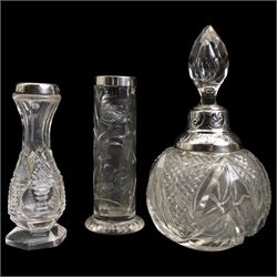 Pair of silver mounted glass scent flasks H20cm London 1916 Maker J H Worrall, Son & Co Ltd, , another matching of tapering form, a small scent flask in outer silver sleeve Birmingham 1902 and various silver mounted glass scent flasks, vases etc  (11)