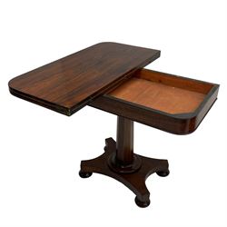 Early Victorian rosewood card table, rectangular swivel and fold-over top with rounded corners, baize lined interior, tapered octagonal column on concaved rectangular platform, on four turned feet 