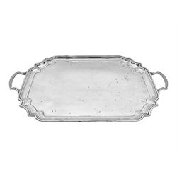 Modern silver twin handled tray, of rectangular form with shaped canted corners, hallmarke...