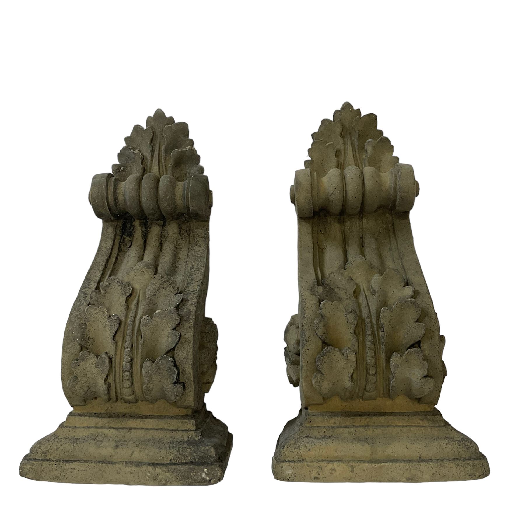 Pair of Victorian design cast stone architectural corbel wall brackets, stepped rectangular top over a scrolled bracket with relief acanthus leaf decoration and rosette motifs to the side