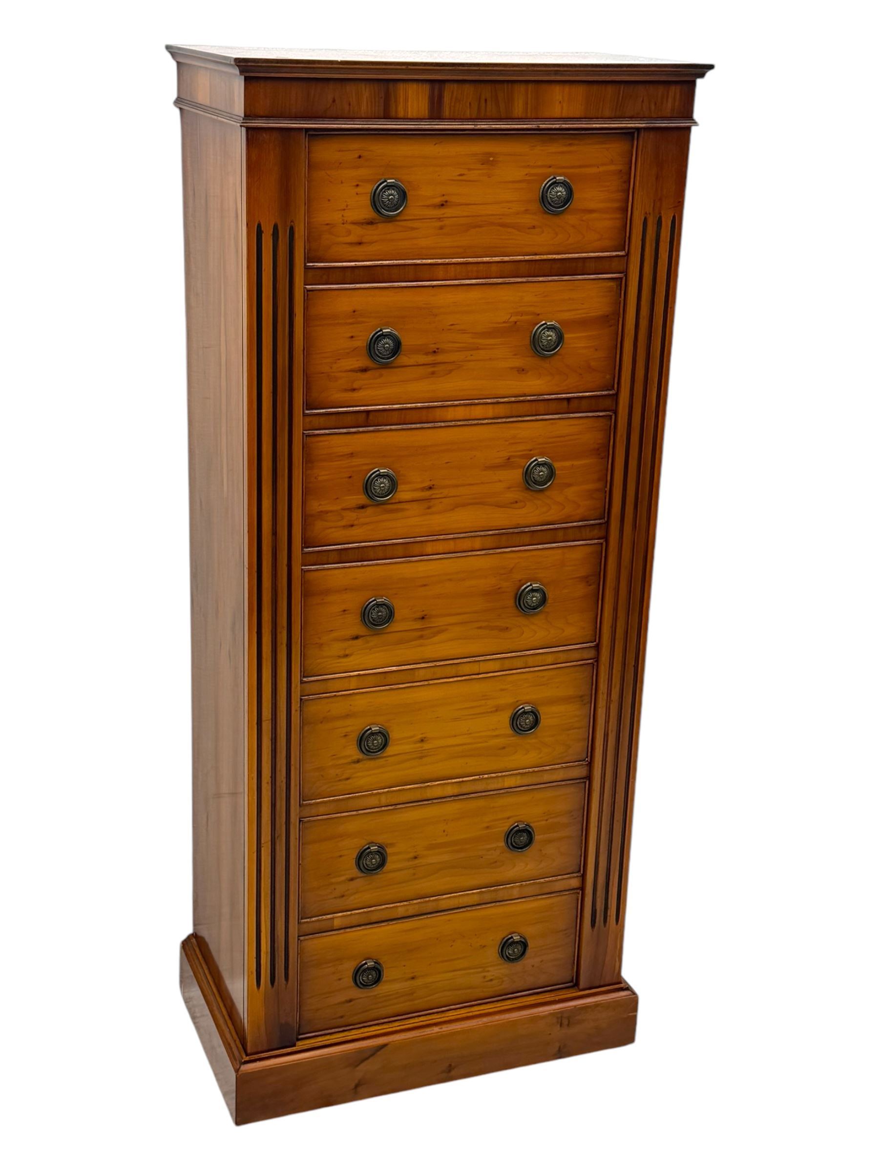 21st century steel lined gun cabinet, modelled as a Wellington chest of yew wood, to hold six long guns, interior lined with green baize, three storage shelves, with keys and bolts 