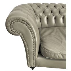 Three seat Chesterfield sofa, upholstered in grey buttoned leather