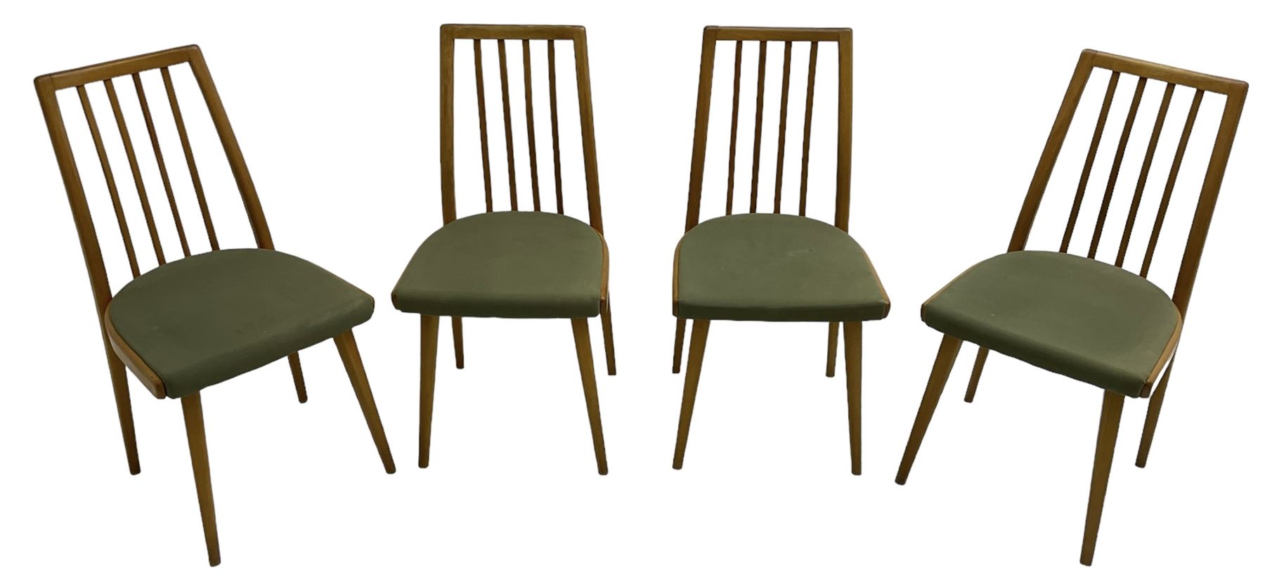 Set of four mid-20th century beech framed dining chairs, vertical slat back over upholstered seats, on tapering supports