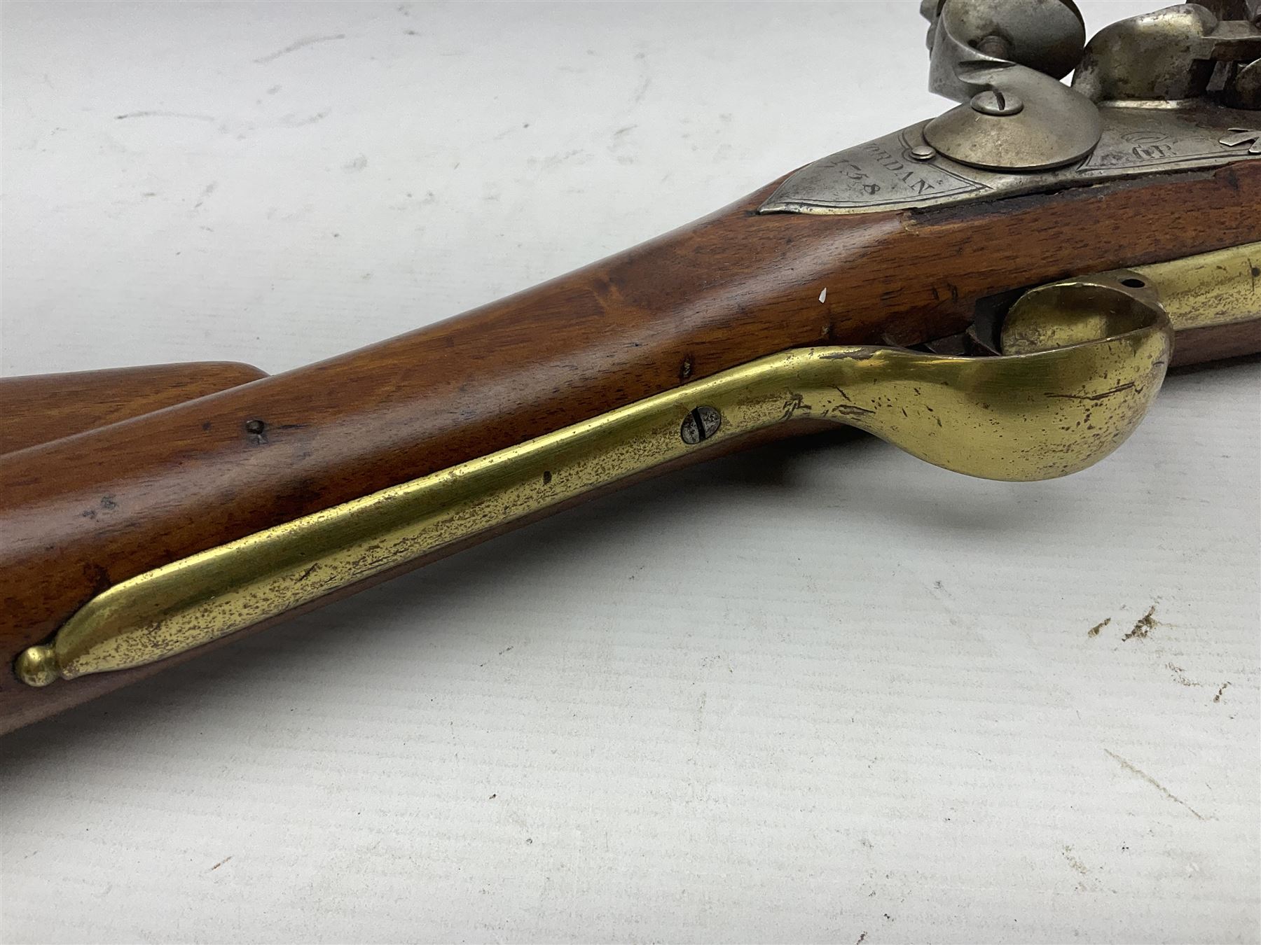 Brown Bess style 10-bore flintlock musket, the action marked with Crowned GR, 'Jordan' and dated 1758, the 104cm(41