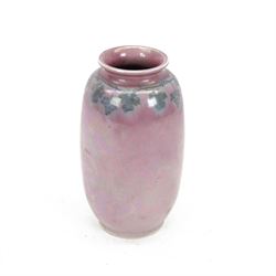 Ruskin Pottery vase, of baluster form, with blue vine decoration upon a pale pink lustre g...