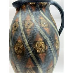 Jackie Walton; Studio pottery large jug decorated with geometric patters, together with another Jackie Walton vase, jug H52cm