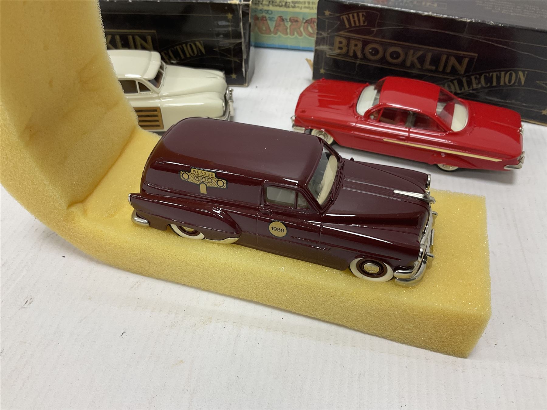 Brooklin Models - three 1:43 scale heavy die-cast model cars comprising BRK31 WMTC 1953 Pontiac Sedan Delivery in maroon with tan interior; BRK43 1948 Packard Station Sedan; BRK44 1961 Chevrolet Impala Sport Coupe; all boxed (3) 