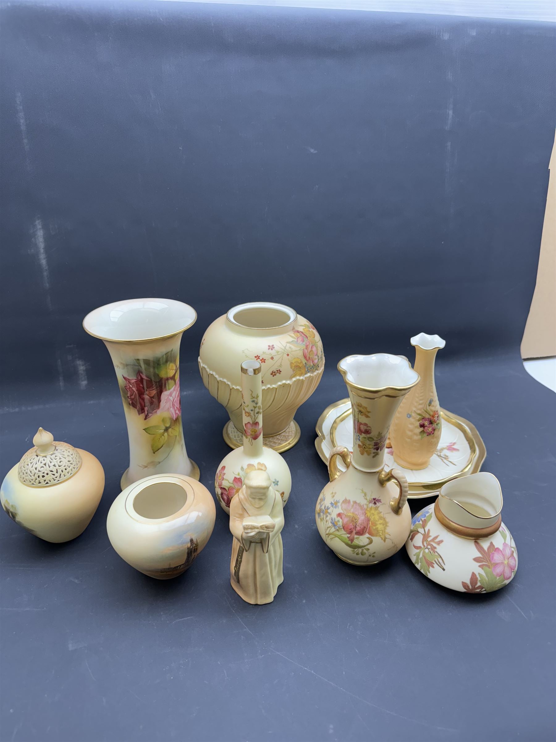 Collection of Royal Worcester Blush Ivory, including candle snuffer modelled as a monk, bamboo vase, twin handled vase etc (12)