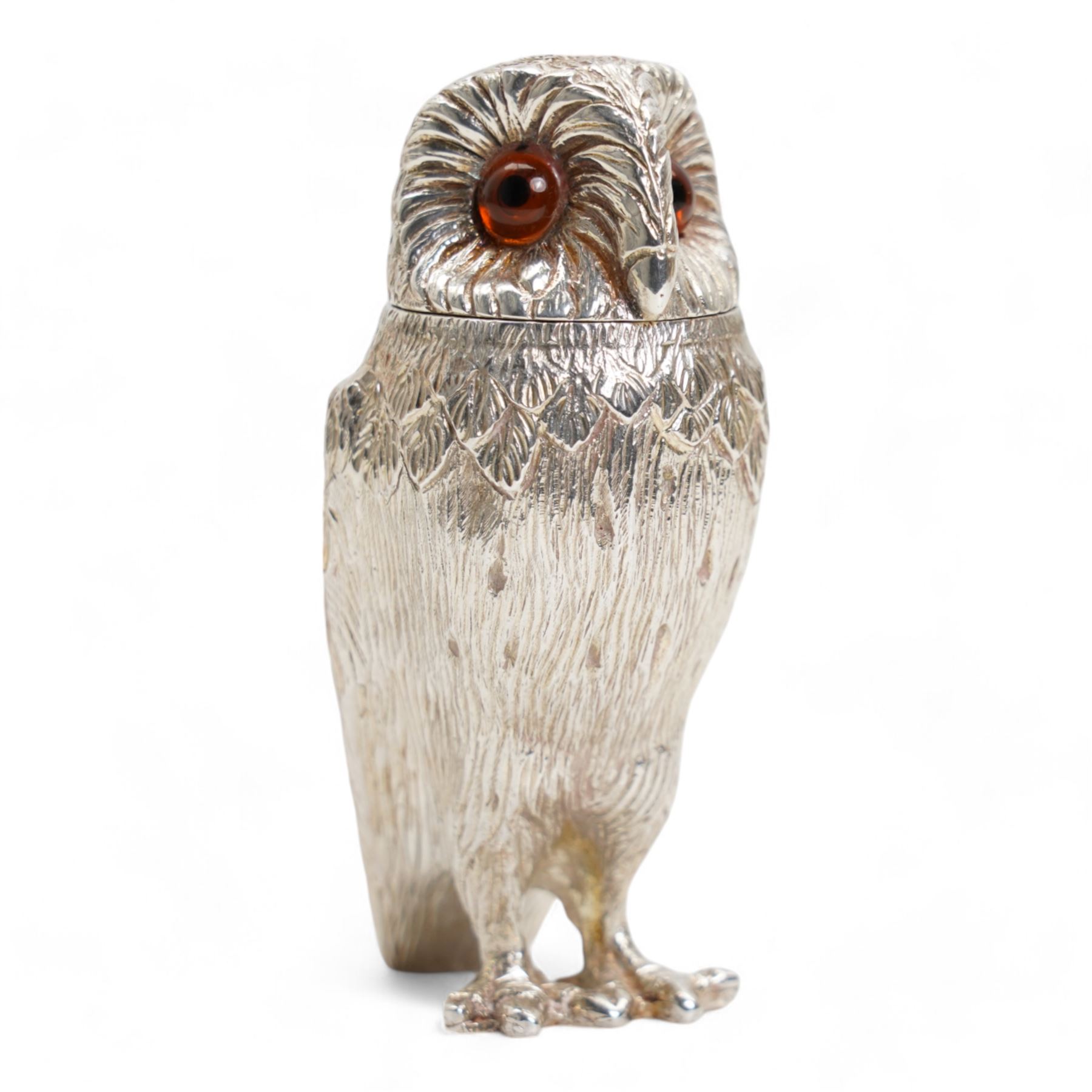 Pair of Elizabeth II silver owl salt and pepper casters with gilded interiors, the naturalistically cast bodies with glass eyes H7.5cm London 2006 Maker Comyns of London 