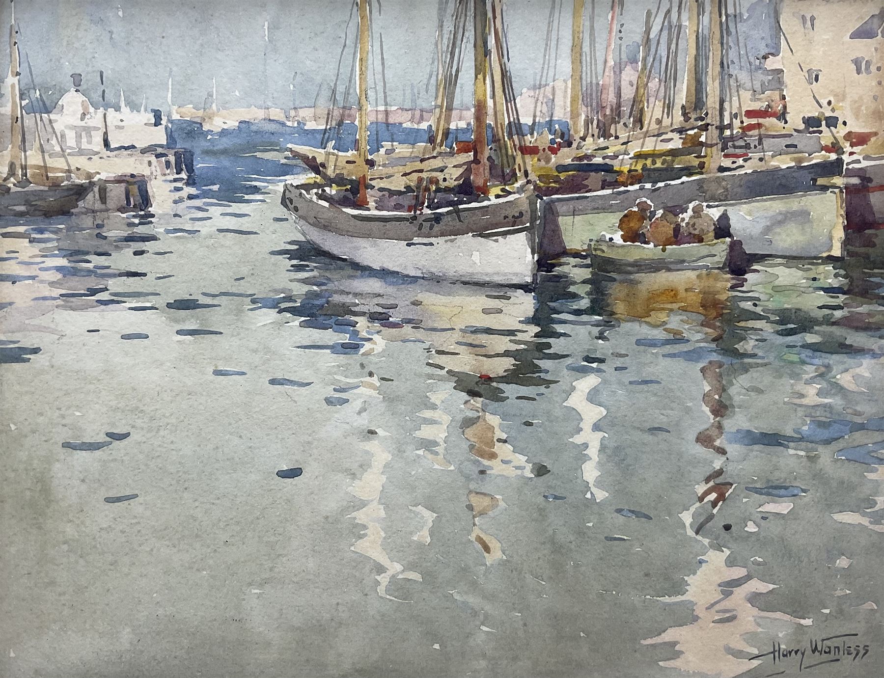 Harry Wanless (British c1872-1934): Fishing Boats by the Quayside (probably Brixham), watercolour signed 20cm x 25cm 
Provenance: direct from the artist's family, part of a collection never previously seen on the market