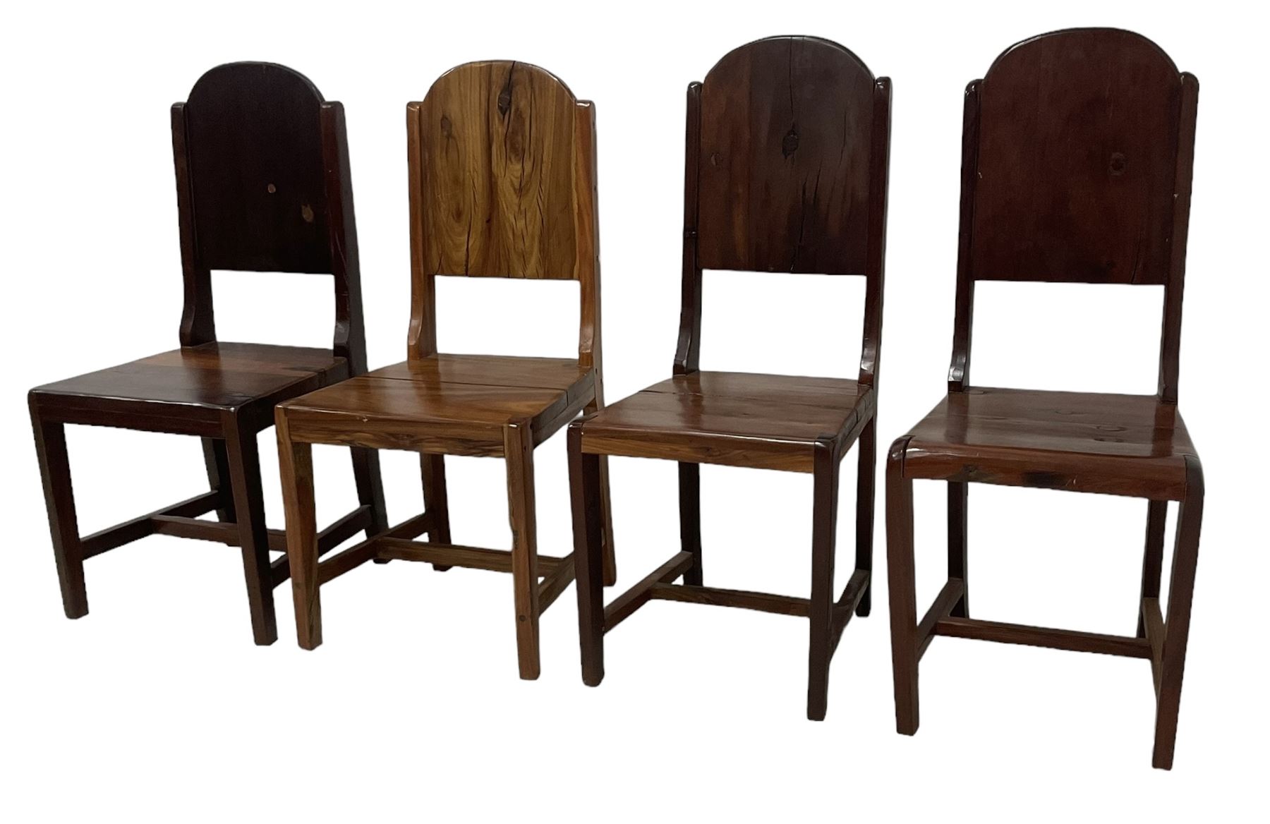 Mid-to-late 20th century teak dining table, rectangular top with canted corners, on square tapering supports with spade feet (214cm x 119cm, H76cm); and a set of eight Burmese reclaimed teak dining chairs, high arched back over panelled seat