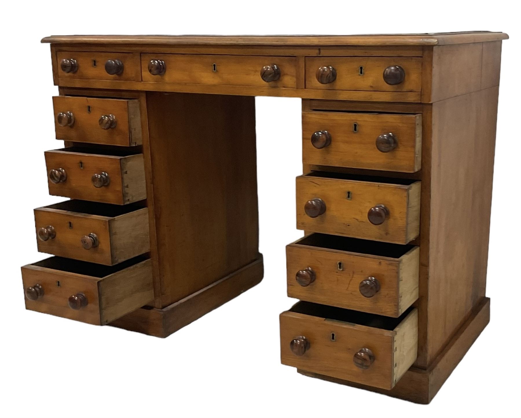 Victorian mahogany twin pedestal desk, rectangular top with inset green leather writing surface, fitted with central frieze drawer flanked by five graduating drawers on each side 