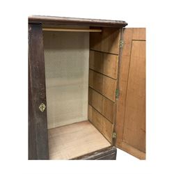 18th century oak linen press, moulded cornice over two panelled cupboard doors, the base fitted with two cock-beaded drawers with pieced brass escutcheons and handles, lower moulded edge on bracket feet