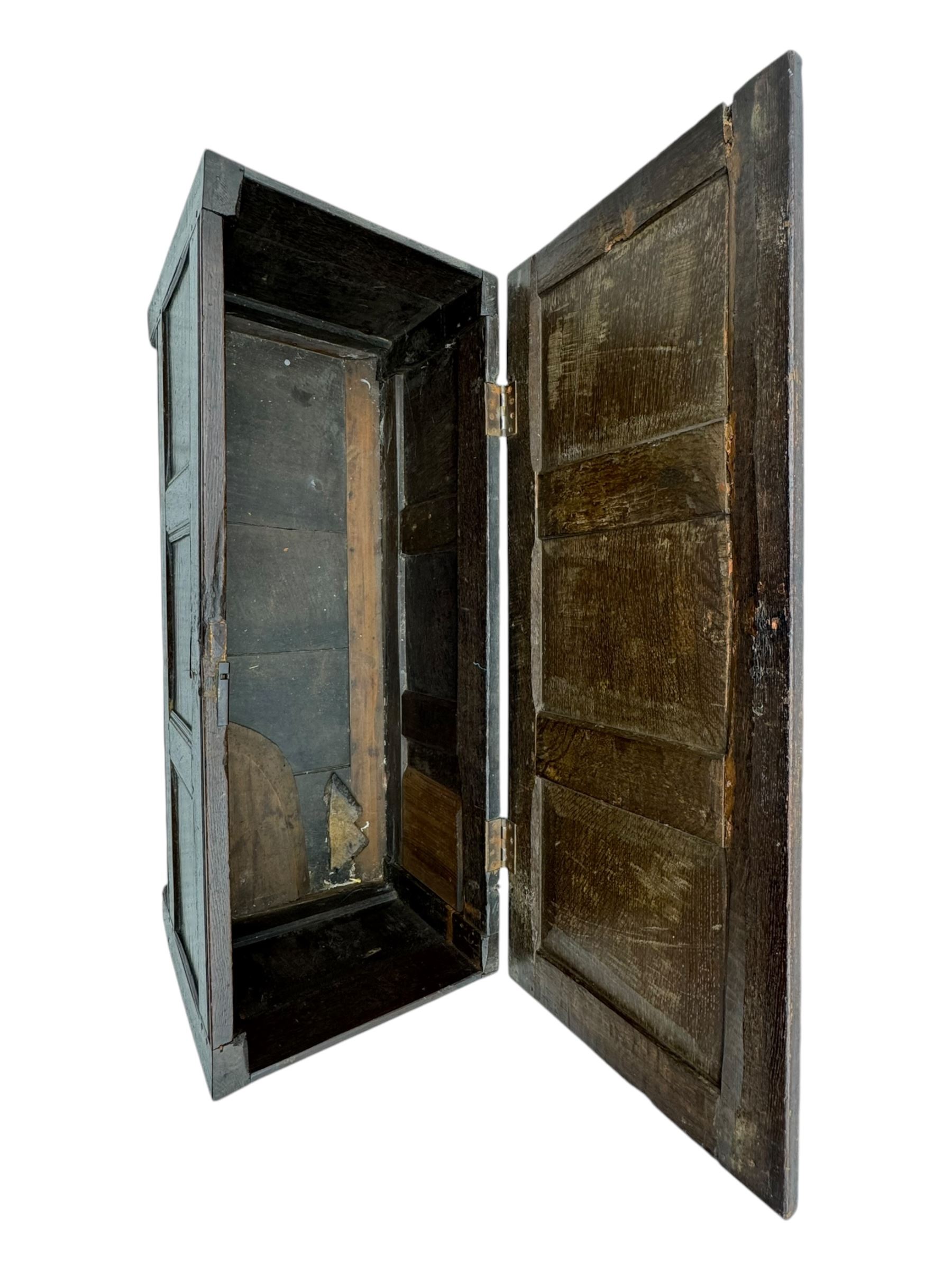 18th century oak blanket box, panelled hinged lid over panelled front, moulded frame, on stile supports 