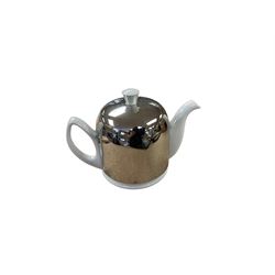 Degrenne Salam White Teapot, together with a collection of silver plated trophy's, etc 