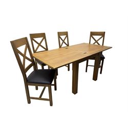 Oak extending dining table, square pull-out action top with folding butterfly leaf, on straight square supports; set of four dining chairs, X-shaped backrest and black upholstered seat, on square supports united by H-stretcher