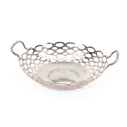 Early 20th century silver twin handled bowl, of circular form with pierced sides, hallmark...