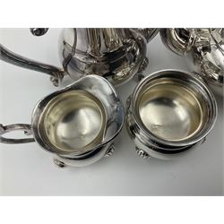 Miniature silver plated four piece tea service, comprising coffee pot, teapot, milk jug and sugar bowl, stamped GRC EPNS beneath, coffee pot H16cm
