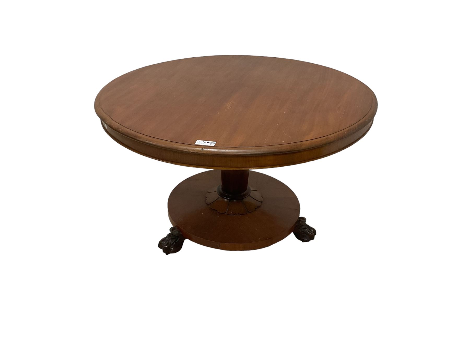 Victorian mahogany breakfast table, circular top with moulded edge, on a tapering pedestal with shaped collar on circular base, raised on three large paw feet