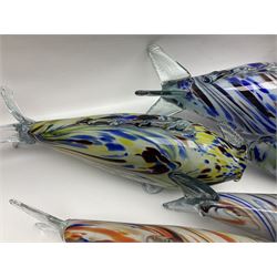 Collection of mid 20th century murano style glass fish, each with multi coloured inclusions largest L42cm