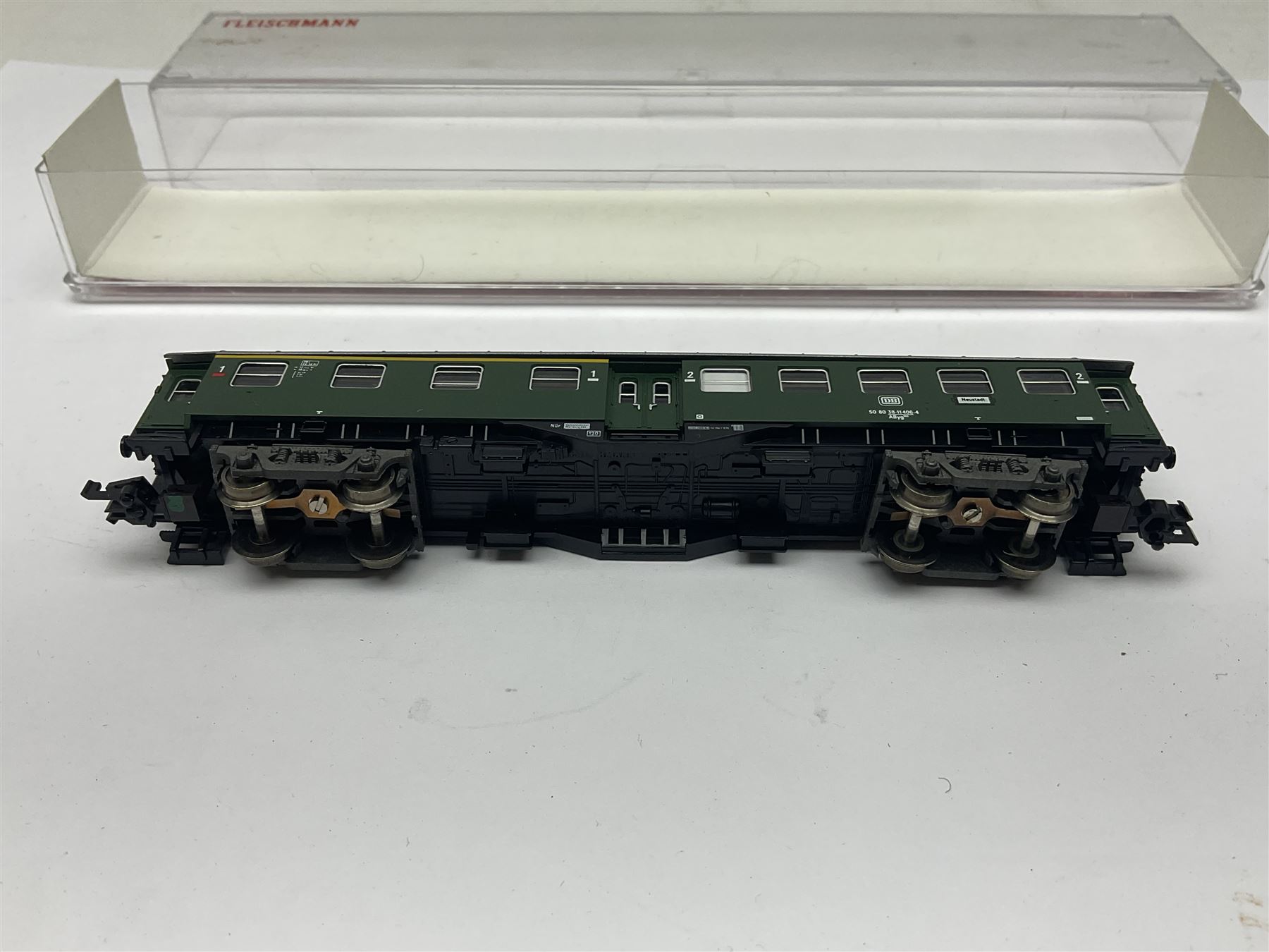 Fleischmann ‘N’ gauge ‘Piccolo’ - sixteen carriages, wagons and cars comprising nos. 8051, 8052, 8055, 8064, 8119K, 8127, 8128, 8129, 8202, 8211, 8224, 8240, 8281, 8301, 8500, 9372; along with Minitrix N503 Shock Van and 13576 6 ton Mineral Wagon; boxed and loose (18) 