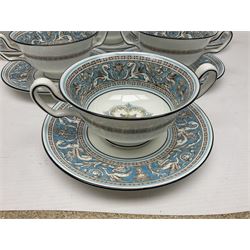 Six Wedgwood Florentine pattern twin handled soup bowls and saucers 