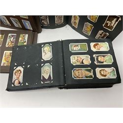 Four albums of cigarette cards, including Will's and Player's examples