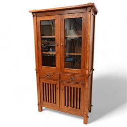 20th century reclaimed hardwood bookcase display cabinet, fitted with two glazed doors above two drawers, two slatted cupboards to base