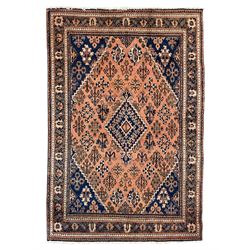 Persian Joshaghan peach and blue ground rug, central stepped lozenge medallion surrounded by bunches of floral motifs, repeating border decorated with stylised plant motifs, within multiple guard stripes