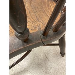 19th century yew wood and elm Windsor chair, low hoop stick back with pierced splat, dished seat raised on ring turned supports joined by crinoline stretcher