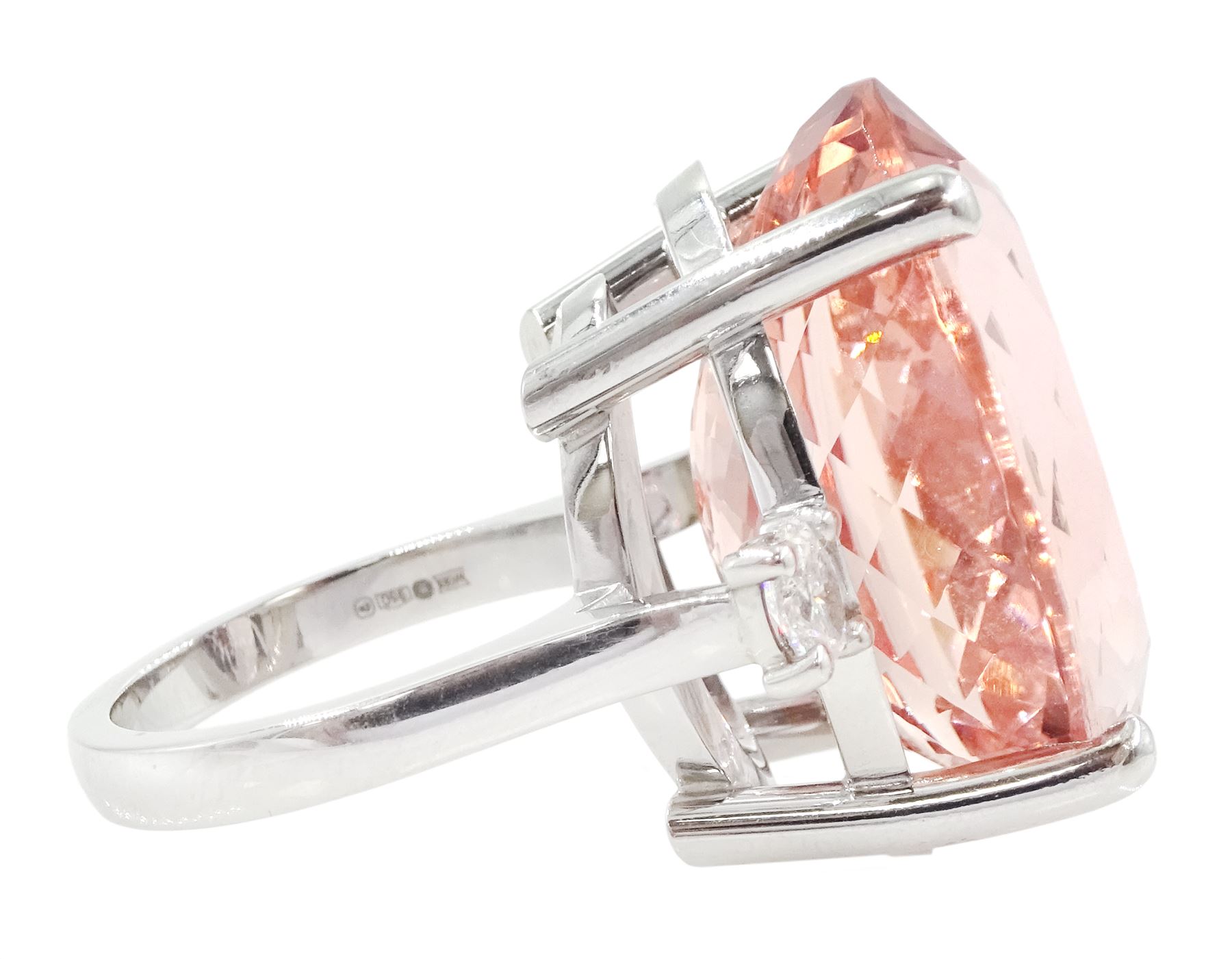 Platinum three stone large oval cut morganite and oval cut diamond ring, hallmarked, morganite 33.80 carat, total diamond weight 0.60 carat, with World Gemological Institute report