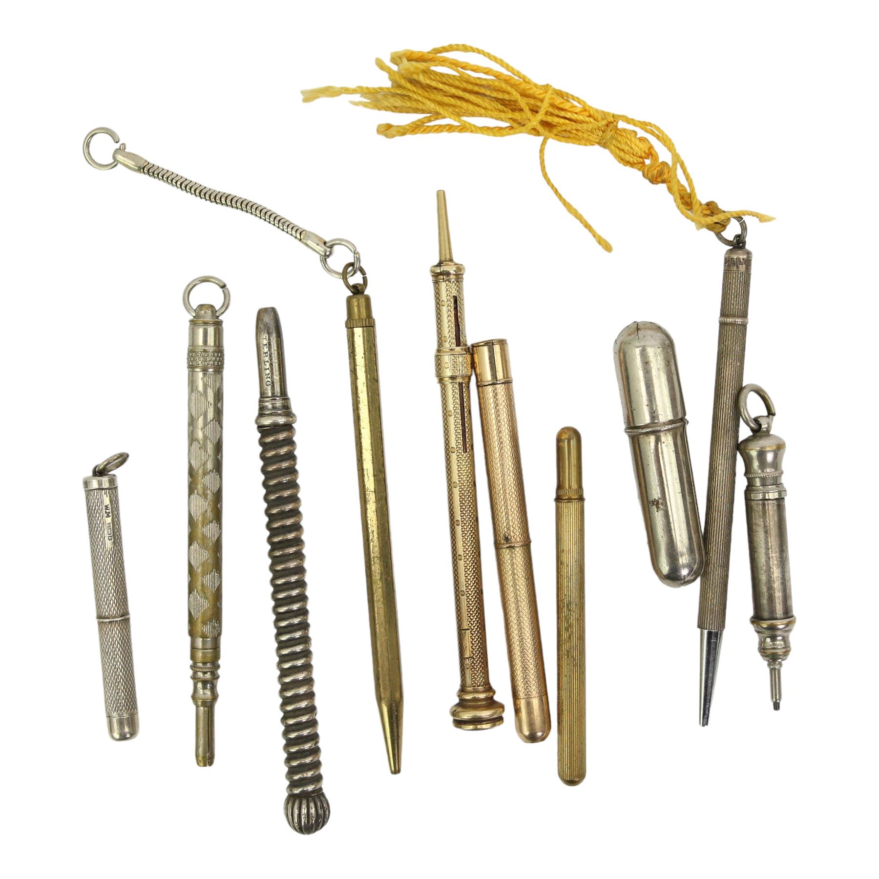 Early 20th century and later propelling pencils and accessories to include a Sterling silver pencil with barley twist stem, gold plated pencil with agate terminal, intaglio engraved with a large cat and various others 