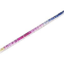 18ct white gold channel set multicoloured sapphire bracelet, sixty-one princess cut sapphires, various hues including blue, pink, green, yellow and teal, London 2004