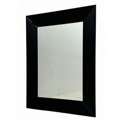 Contemporary black lacquered mirror, rectangular plate set within a bevelled frame with a ...